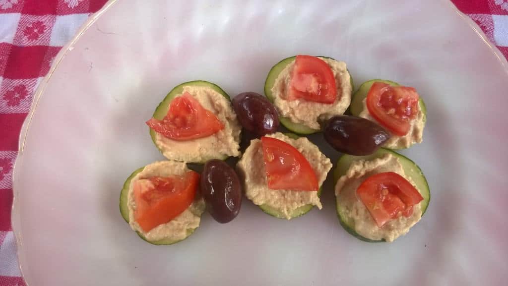Cucumber, tomatoes, hummus and olives